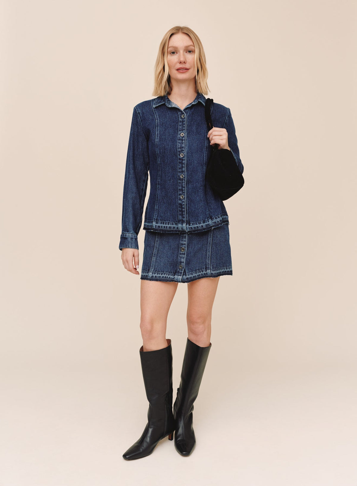 BUTTON FRONT MINI SKIRT WITH RELEASE HEM